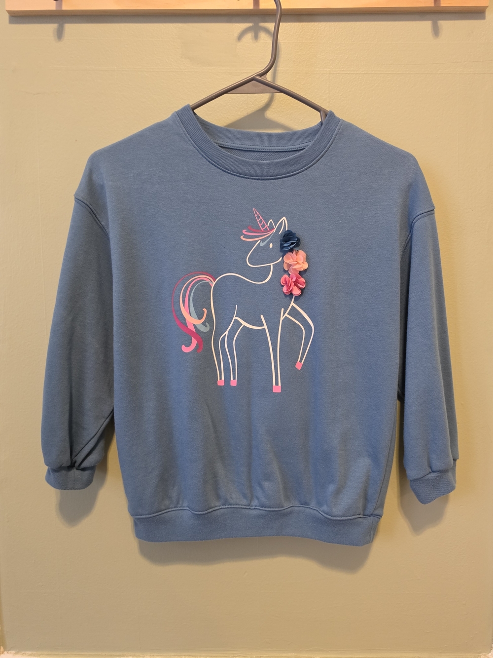 Blue Unicorn Graphic Sweatshirt with Floral Accents